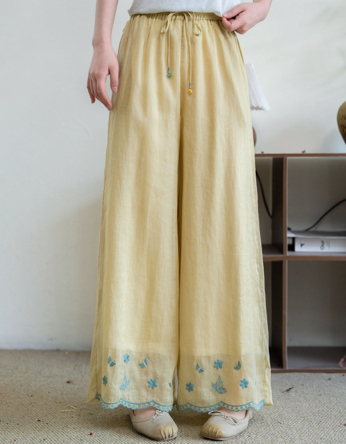 women embroidered linen wide leg pants front view