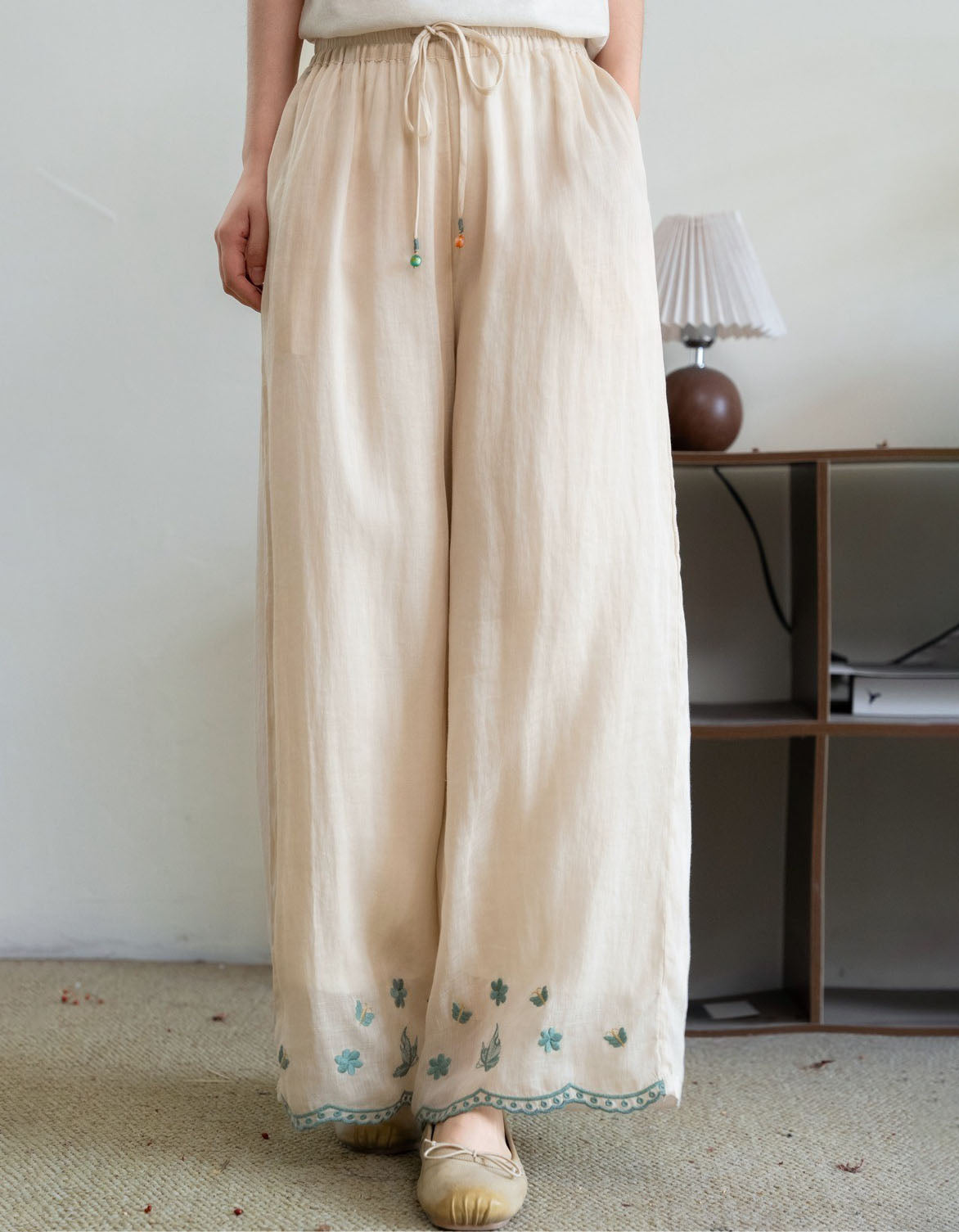 wide leg linen pants with embroidery detail hem