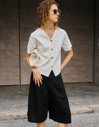 Women wearing high-waist loose linen shorts summer casual outfit