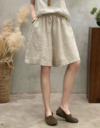 Casual women’s knee length wide leg shorts paired with relaxed top