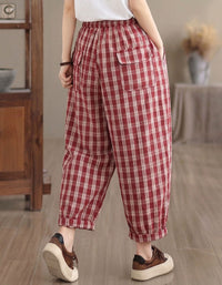 Red plaid cotton women’s pants with elastic waist and side pockets