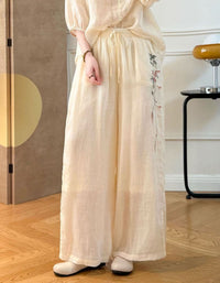 Cottagecore inspired pink wide leg trousers with lightweight fabric