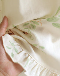 Soft pastel green floral pajama set with elastic waist shorts