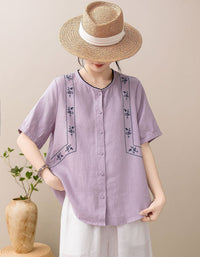 Women's vintage embroidered linen blend button-up blouse in lavender with floral embroidery