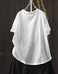 Back view of oversized white women’s tee styled for relaxed everyday wear