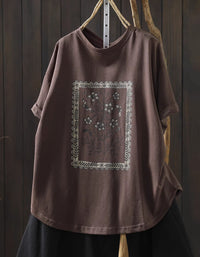 Front view of coffee oversized floral graphic t-shirt with vintage botanical print

