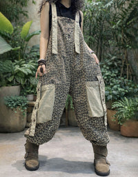 Woman wearing baggy leopard print overalls with large cargo pockets and boots
