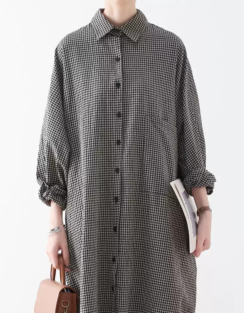 Close up of plaid pattern on women button down shirt dress