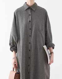 Close up of plaid pattern on women button down shirt dress