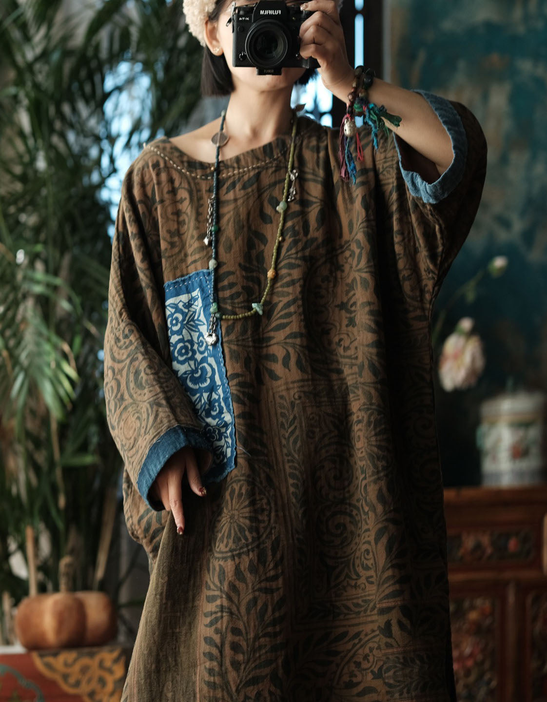 women oversized linen tunic dress styled with wide leg pants