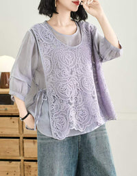 Vintage inspired cotton linen blouse with intricate lace detailing and round neckline