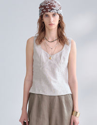 Women wearing black sleeveless linen blend V neck top