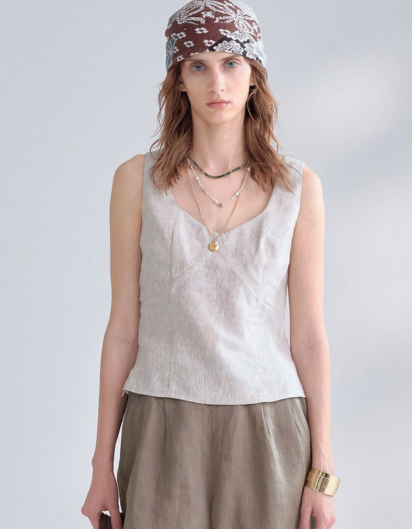 Women wearing black sleeveless linen blend V neck top