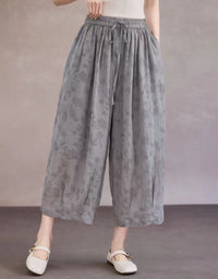 Women lightweight floral palazzo pants paired with flats