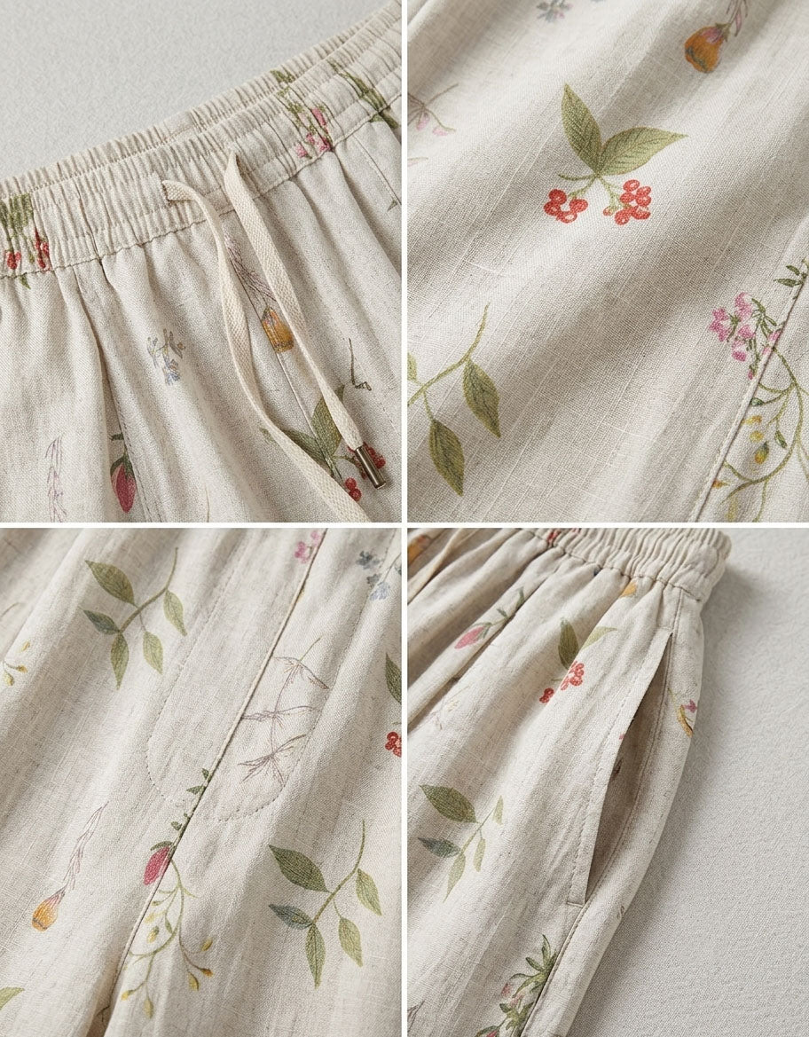Woman wearing white floral linen wide leg pants for a casual boho summer outfit