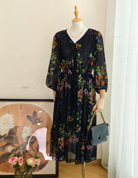 Women's vintage floral print chiffon midi dress with long sleeves and flowy boho silhouette in black floral pattern