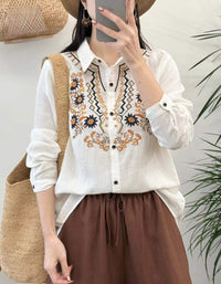 Women's white embroidered linen blouse with floral embroidery and button-down front