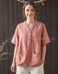 Women’s vintage cotton linen blouse in dusty pink with short sleeves, henley neckline and front pockets, loose casual fit
