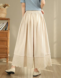 Beige wide leg skirt pants for women with lace hem and elastic waist