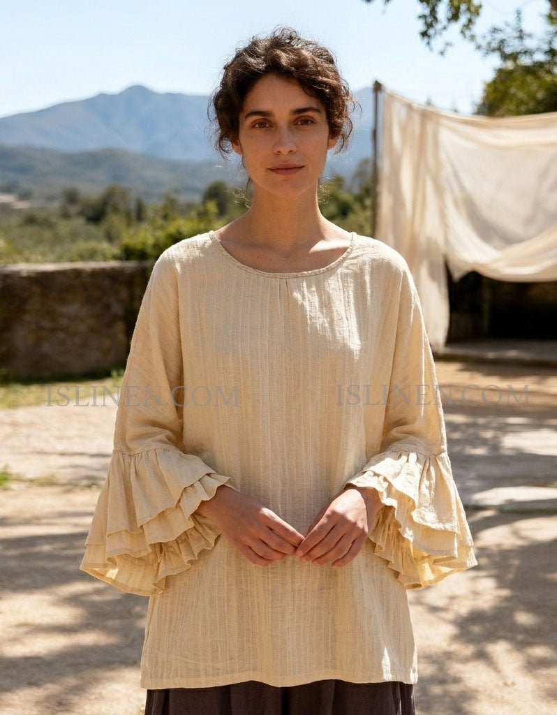 Women wearing beige linen blouse with ruffle sleeves outdoor