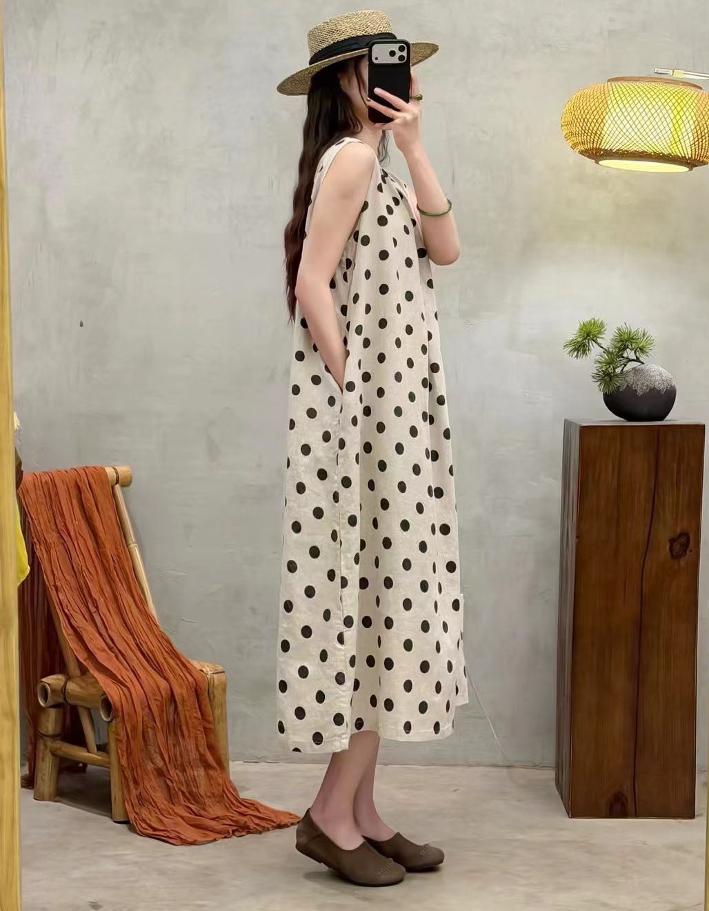 Loose fit sleeveless linen dress with polka dot pattern