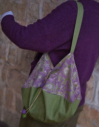 Large capacity floral hobo tote bag paired with vintage style clothing