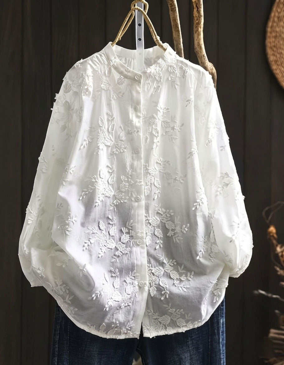 Women’s vintage white cotton blouse with delicate embroidery and loose fit design