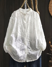 Women’s vintage white cotton blouse with delicate embroidery and loose fit design