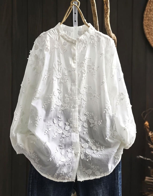 Women’s vintage white cotton blouse with delicate embroidery and loose fit design