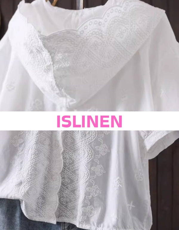 Lace embroidery detail white blouse women close up