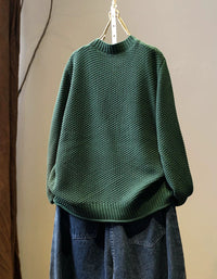 Women’s green textured knit sweater, back view