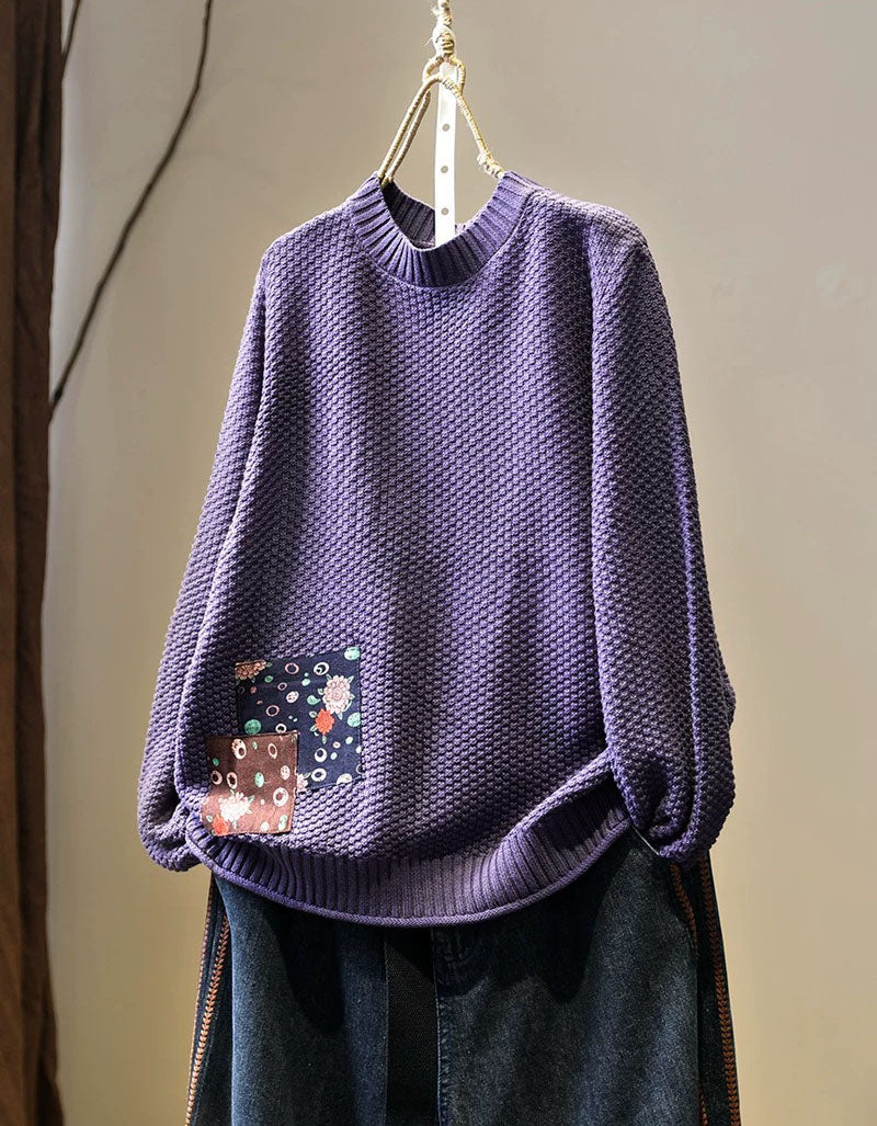 Women’s purple textured knit sweater with patchwork detail, front view