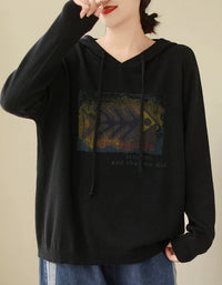 Black oversized hooded knit sweater for women