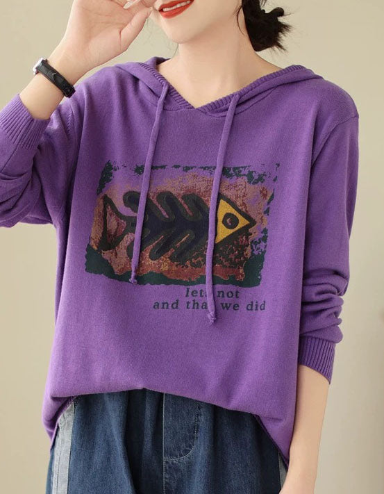 Women’s purple sweater with vintage graphic print