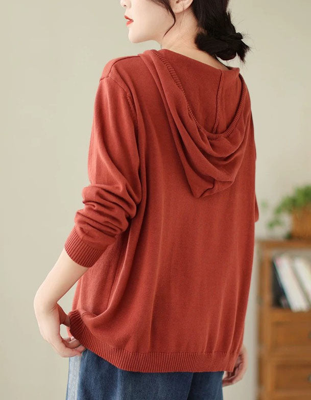 Red women’s hooded knit sweater with drawstring