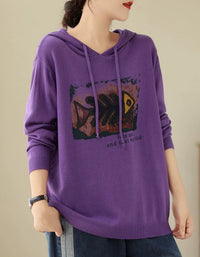 Purple women’s hooded knit sweater with drawstring