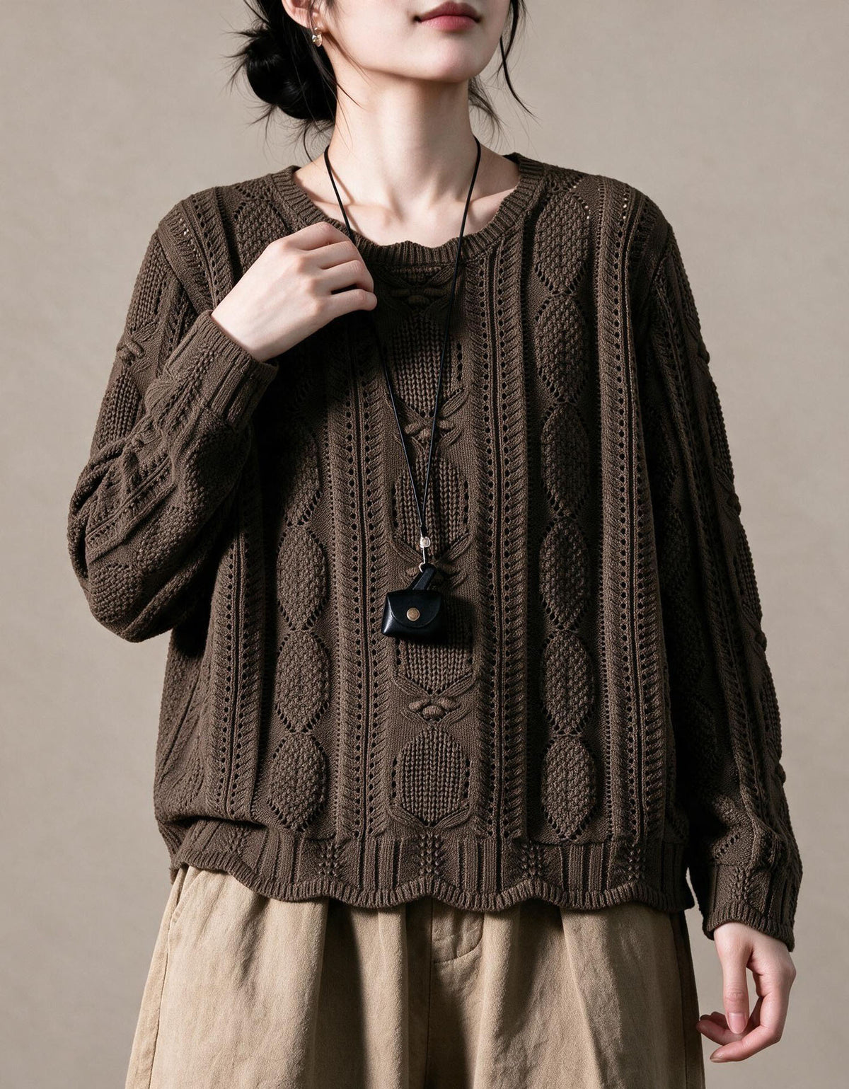 Women's purple vintage sweater styled with brown skirt