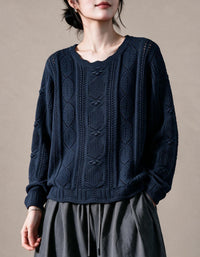 Purple women's sweater with detailed cable knit sleeves