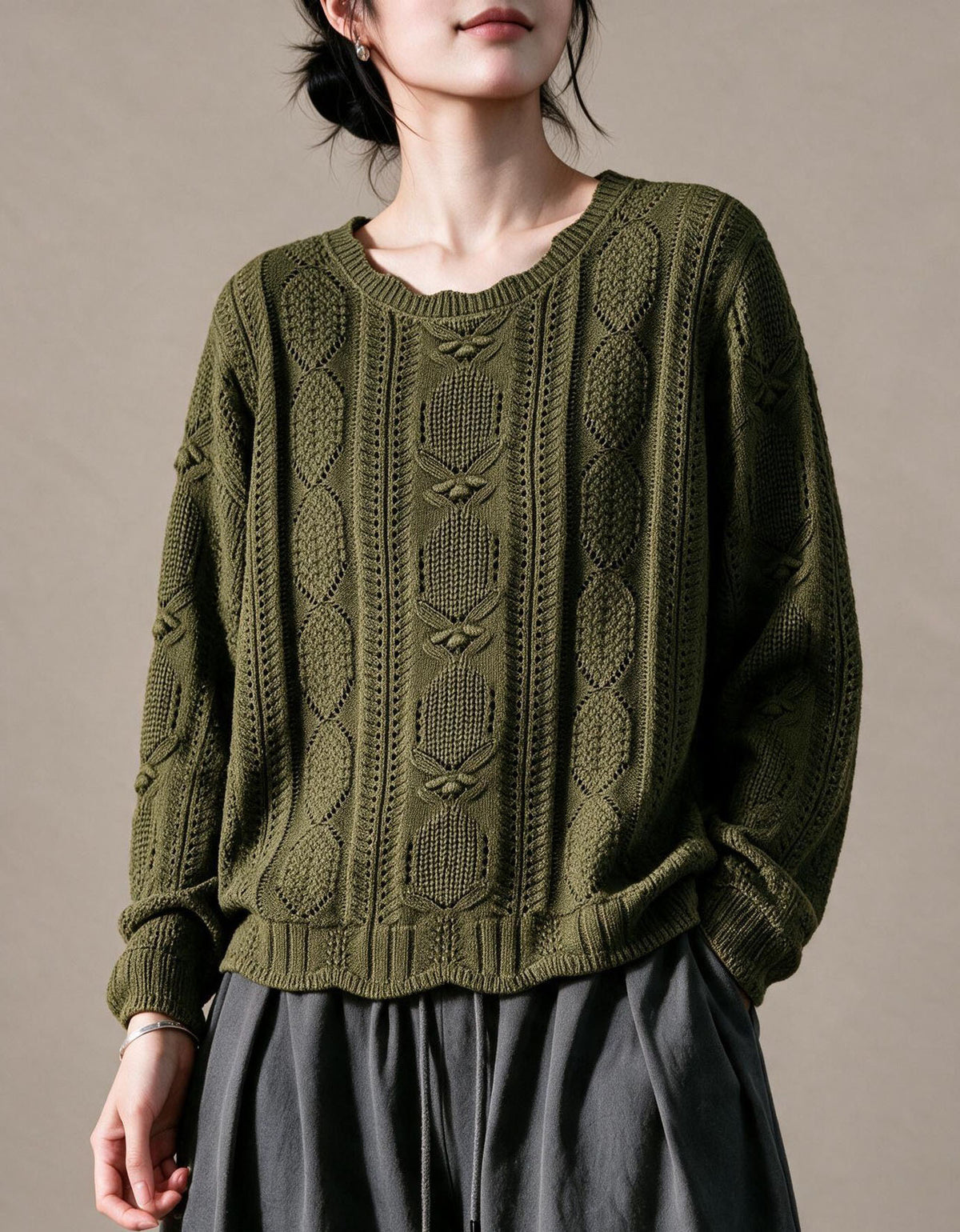 Women's purple cable knit sweater crew neckline detail