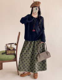 Vintage-inspired brown midi skirt styled with a casual top