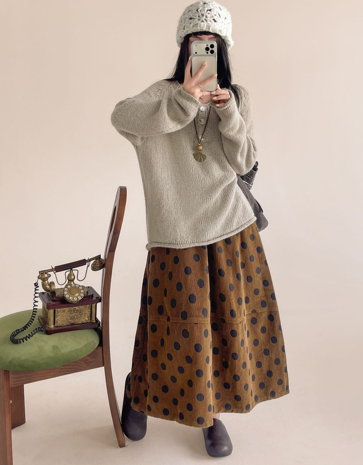 Brown corduroy midi skirt with black polka dot pattern