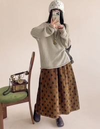 Brown corduroy midi skirt with black polka dot pattern
