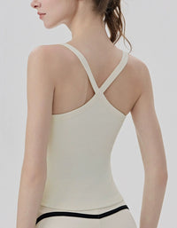 Beige tank top with thin straps on a plain background back view