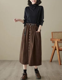 Women’s coffee corduroy skirt with button front and belt detail, perfect for stylish, comfortable everyday wear