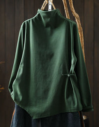 Green women's high neck sweater with asymmetrical hem and side button detail