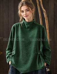 Dark green women's high neck sweater with asymmetrical hem and side button detail