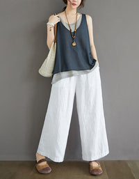 Soft fabric tank top with adjustable straps and layered design for women