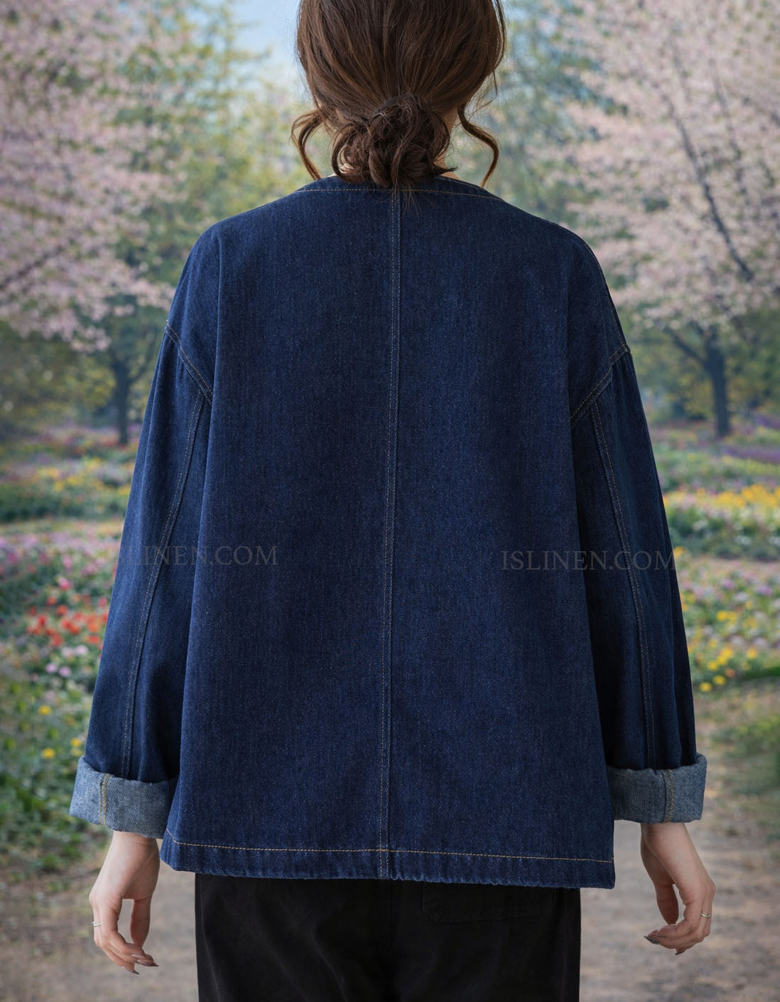 Relaxed fit women’s denim jacket outdoor styling back view