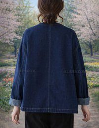 Relaxed fit women’s denim jacket outdoor styling back view