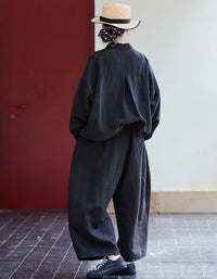 Minimalist linen trousers women relaxed silhouette back view